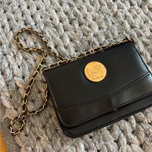 Chic Black Bag with Gold Accents